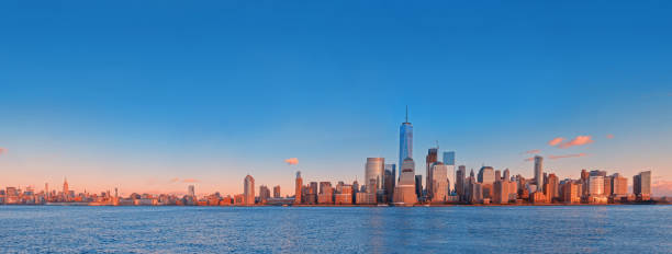 istock Manhattan skyline panorama at sunset , New York City 1289026807