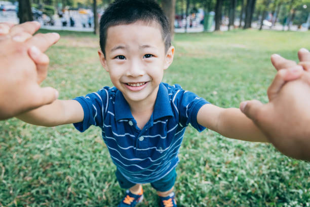 istock Father and son in the park 1289027610