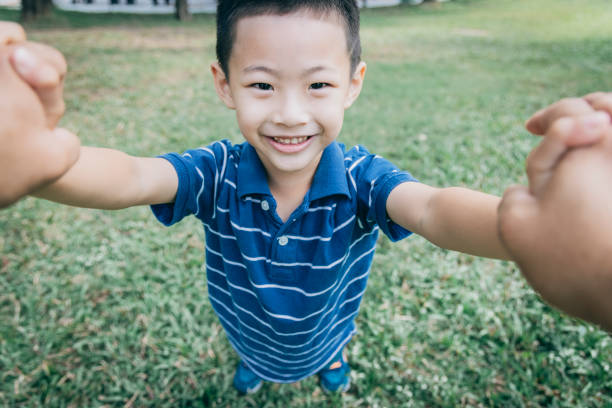 istock Father and son in the park 1289027633