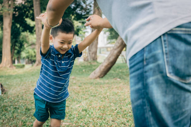 istock Father and son in the park 1289028155