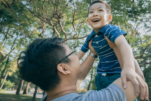 istock Father and son in the park 1289028169