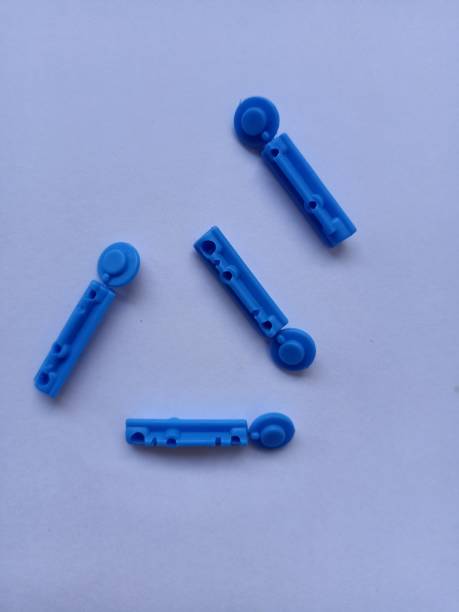 istock Close-up of glucose lancing devices 1289028812