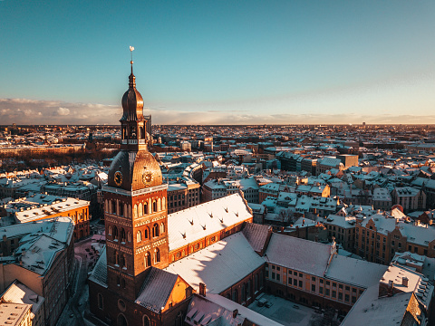 Old town Riga cityscape first snow, early morning Sunrise