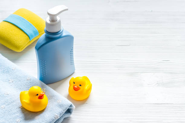 istock Baby accessories for bath with care products and rubber duck 1289032349