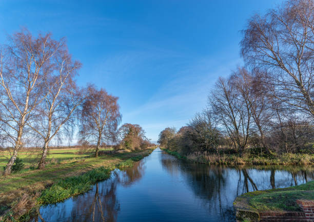 Melbourne Arm Pocklington Canal View of Pocklington Canal from Melbourne Arm on bright sunny day. east riding of yorkshire photos stock pictures, royalty-free photos & images