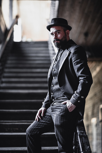 Aristocratic Male In Vintage Clothing Standing On Staircase