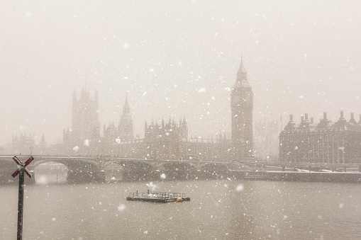 View of The Houses of Parliament during a snowstorm in London