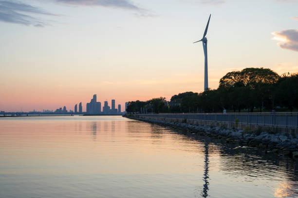 Wind Turbine at sunset in Toronto Ontario Canada Wind Turbine at sunset in Toronto Ontario Canada sustainable energy toronto stock pictures, royalty-free photos & images