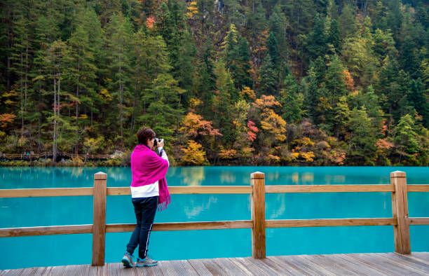 istock A woman is by the lake 1289043745