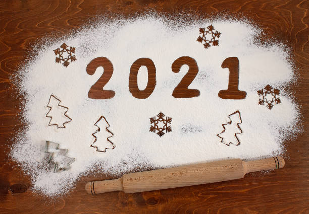 istock Number 2021 created from flour on wooden background 1289044291