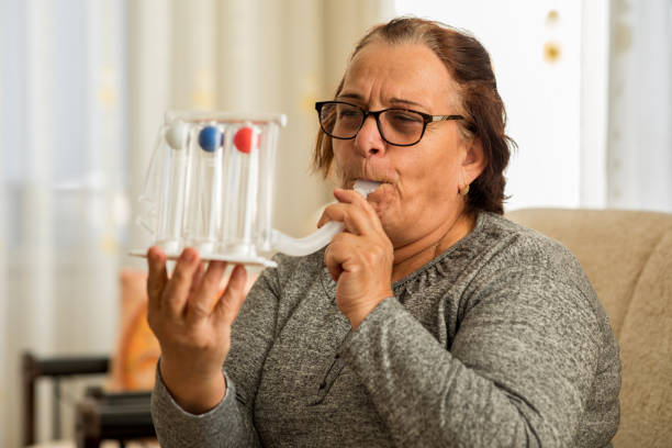 istock Old woman with breathing problems at home 1289047423