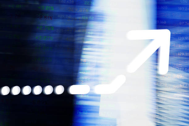 istock Finance. Arrow. Abstract office Buildings and Trading Screen Data. 1289048280