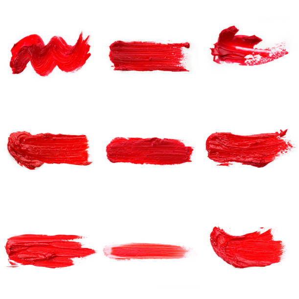 istock Lipstick smear smudge swatch isolated on white background. Cream makeup texture. Bright red color cosmetic product brush stroke swipe sample 1289048283