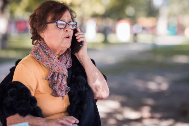 istock Worried older lady having phone conversation 1289048825
