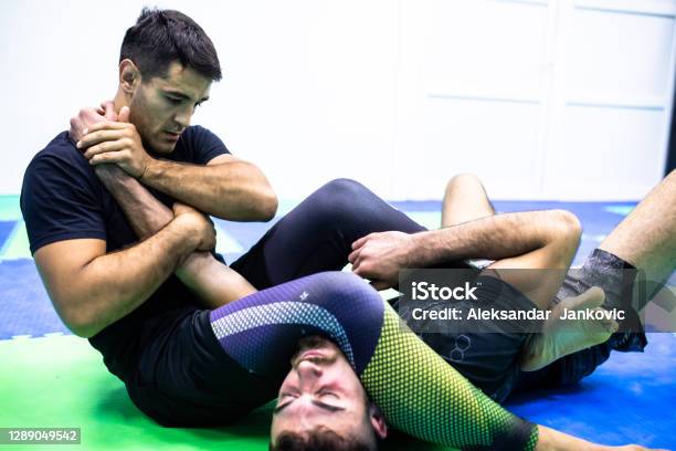 Fighters At Bjj Practice Stock Photo - Download Image Now - Combat Sport, Mixed Martial Arts, Brazilian Jiu-Jitsu