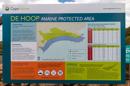 Overberg, South Africa - October 27, 2019: Information sign of De Hoop Nature Reserve Marine Protected Area