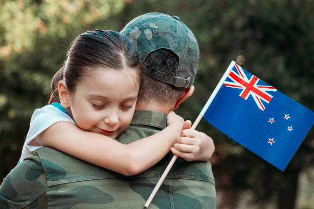 istock Australian Soldier And His Daughter 1289050123
