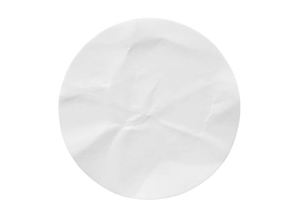 istock Blank white round paper sticker label isolated on white background 1289051130