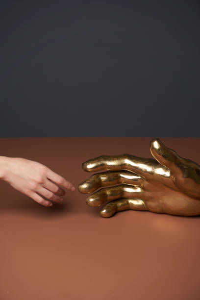 istock Human and robot handshake gesture, close-up 1289051664
