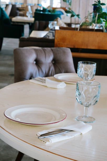 istock elegant table setting with white plate and crystal glass 1289053990
