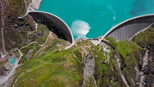 Overhead aerial panorama of Kaprun high mountain reservoirs Mooserboden Stausee dam in the Hohe Tauern, Salzburger land, Austria. Panorama of Stausee Mooserboden Dam near Kaprun, Austria reservoir photos stock pictures, royalty-free photos & images