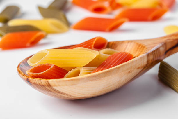istock pasta on white background. close up. creative photo. 1289060458
