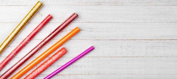 istock Assorted wrapping paper for gifts in rolls on a white wooden background. 1289060713