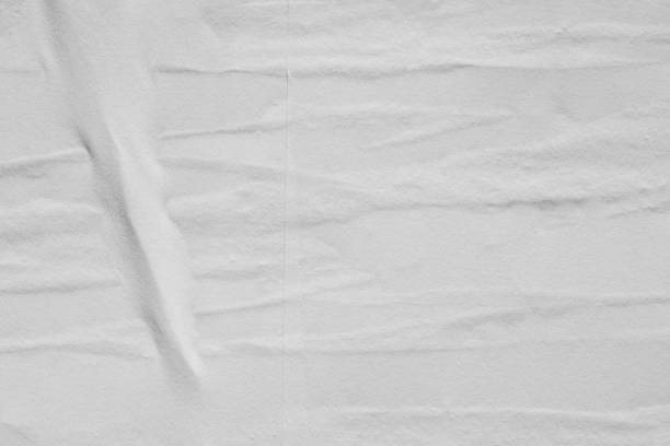 istock Blank white old ripped torn paper crumpled creased posters grunge textures backdrop backgrounds surface 1289060741