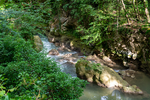 black river that comes from the marmore waterfalls in Terni, Umbria, Italy