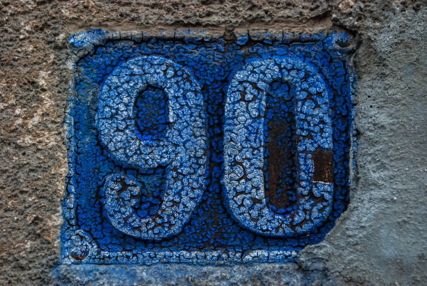 istock Old retro cast iron plate number 90 1289063615