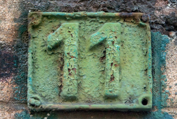 Old retro cast iron plate number 11