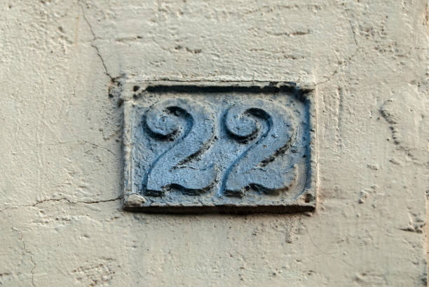 istock Old retro cast iron plate number 22 1289063694