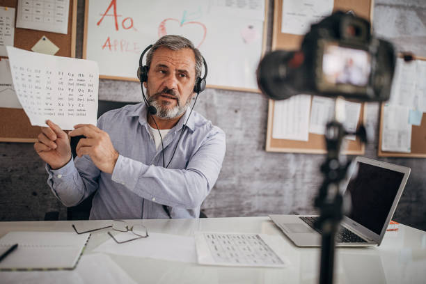 istock Male teaching students online during pandemic  isolation period 1289064023