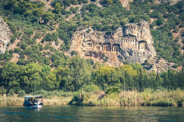 Lycian tombs on the Dalyan river. Ancient buildings.