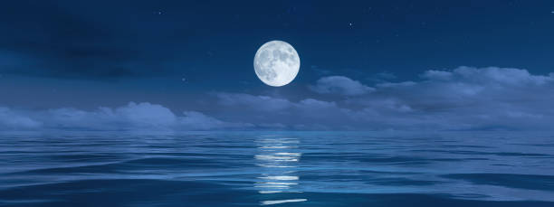 istock pale moon over the ocean banner background 1289067484