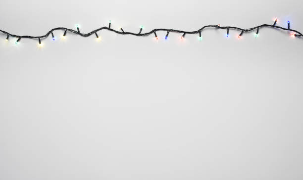istock Christmas lights on the white background with copy space 1289074648