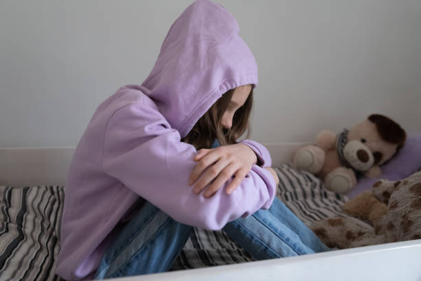 istock Upset teenage girl suffer from school discrimination problems 1289074868