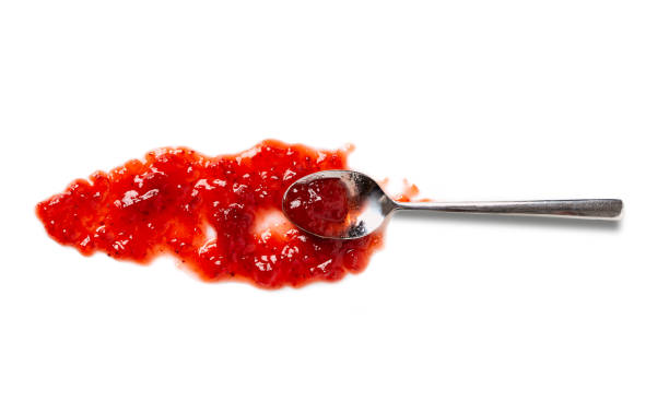 spoon with sweet jam - currant red isolated fruit imagens e fotografias de stock
