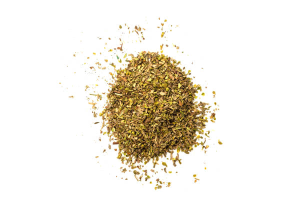 istock Oregano in a bowl isolated. 1289078367