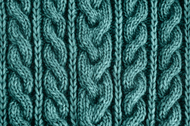 istock Tidewater green colored knitted texture. Handmade Knitwear. Background. 1289078566