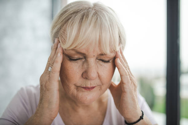 istock Mature Woman With a Headache 1289080876