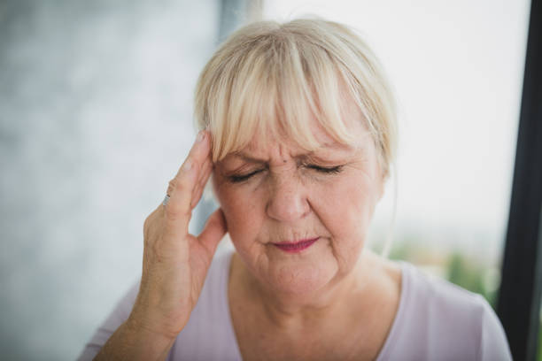 istock Mature Woman With a Headache 1289080877