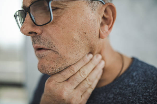 istock Senior Man With Throat Pain 1289080880