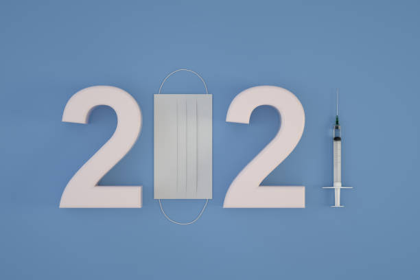 istock 2021 Coronavirus Year, Syringe and Face Mask 1289081020