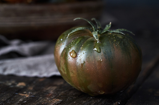 Tomatoes on Rustic Background
