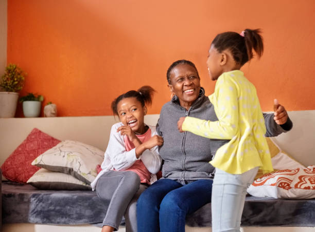 istock Granny playing with grandchildren at home 1289084483