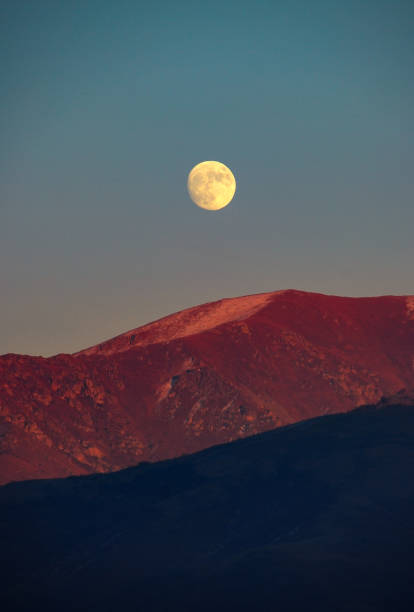 istock Moon over mountain. the moon of november - 28.2020 1289084716