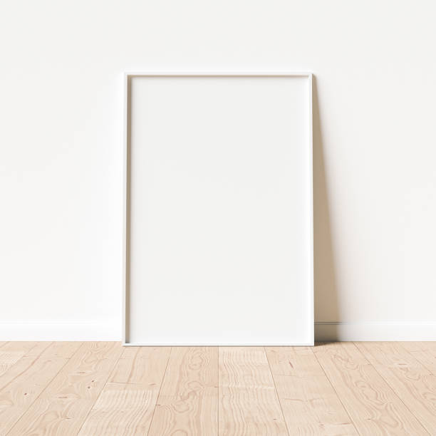 istock A2 White Mockup Frame positioned on wooden flooring 1289086842