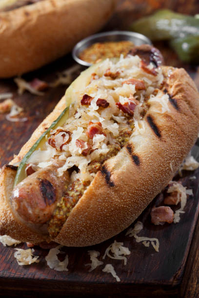 istock Grilled Bratwurst with Fried Sauerkraut and Crispy Bacon 1289088844