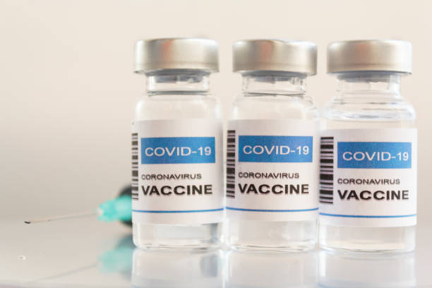 istock Syringe and Covid-19 coronavirus vaccine 1289089254
